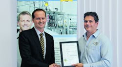 Congratulations: In Sydney, Australia Electrical engineer Rod Burton (right) from Machinery Automation &amp; Robotics, receives the